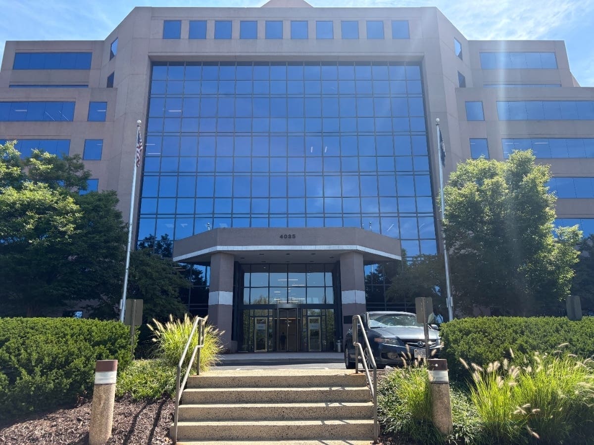Under one proposal under consideration by the county, an existing eight-story office building at 4035 Ridge Top Road west of Fairfax City could be replaced with a combination of stacked and traditional townhouses.