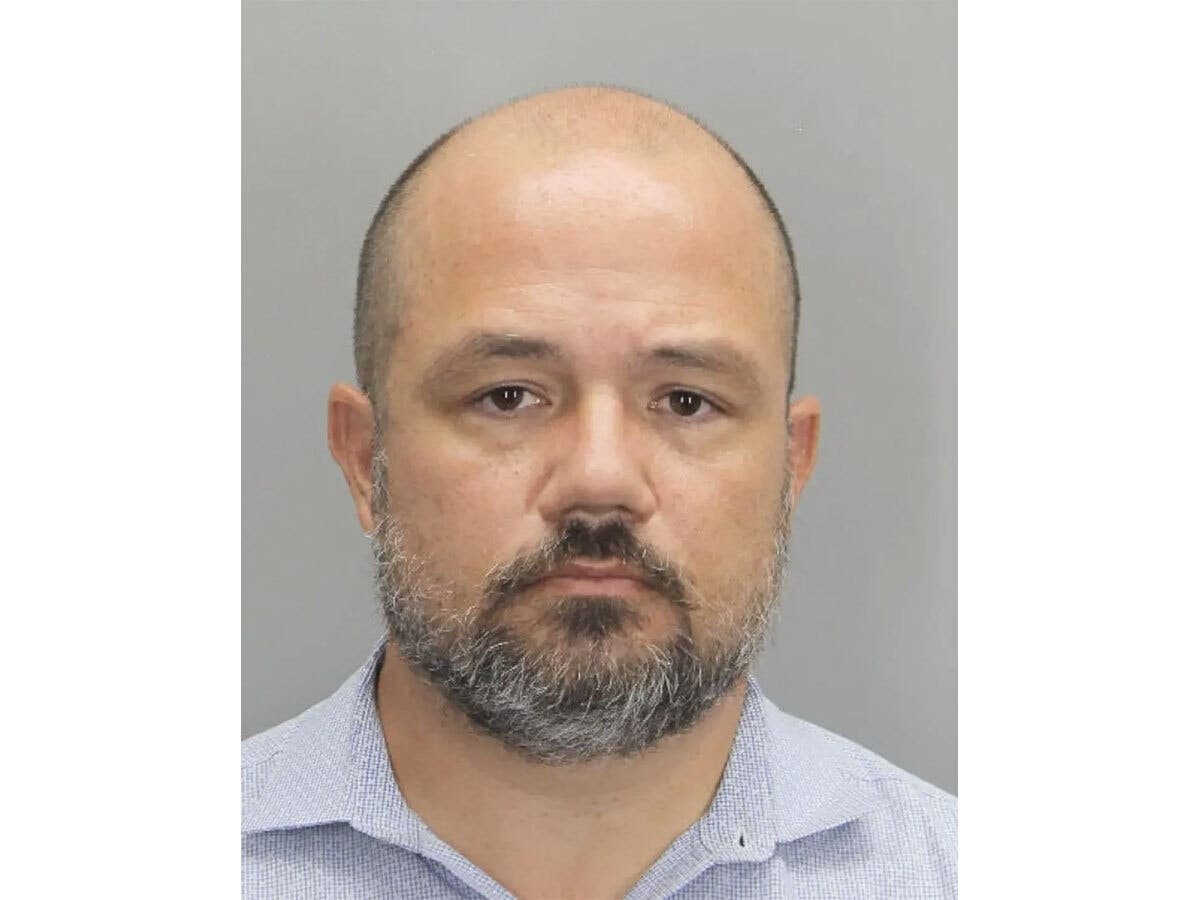 A Falls Church health care CEO faces 34 charges after police investigated reports of women and a teen being filmed in Tysons.