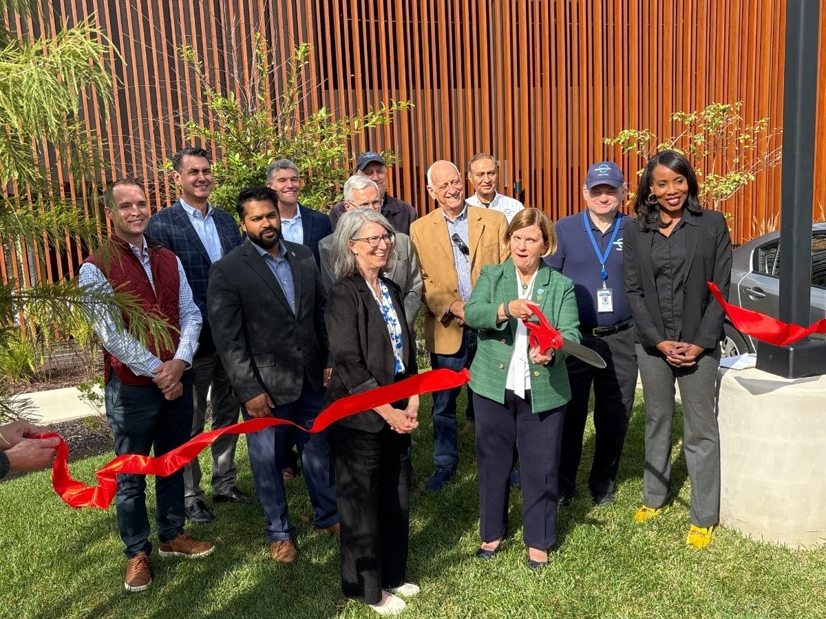 Local elected officials joined state transportation representatives and landowners to cut the ribbon for the Northfax West street grid project, which connected a realigned Orchard Street with an newly extended Farr Avenue north of Fairfax Boulevard.