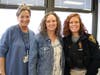 Westfield Municipal Alliance coordinators Louise DeDea and Kerri Oligino join Westfield Police Officer Elizabeth Savnik in welcoming Westfield High School students to the annual Hot Chocolate holiday event.