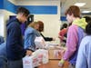Westfield High School students line up to receive hot chocolate as part an annual event hosted by the Dream Team and sponsored by the Westfield Municipal Alliance.