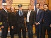 Sam Springsteen was among 15 new Jersey City firefighters sworn in on Tuesday. He's pictured with his rocker parents, Patti Scialfa and Bruce Springsteen.