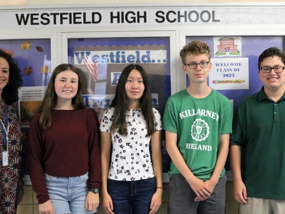 The finalists from WHS, pictured with principal Mary Asfendis, from left: Julia Tompkins, Connie Liu, Aidan Kilbourn, and Ian Gurland. 