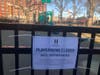 A sign in Elysian Park in Hoboken. Playgrounds were closed on Friday, although parks remain open.