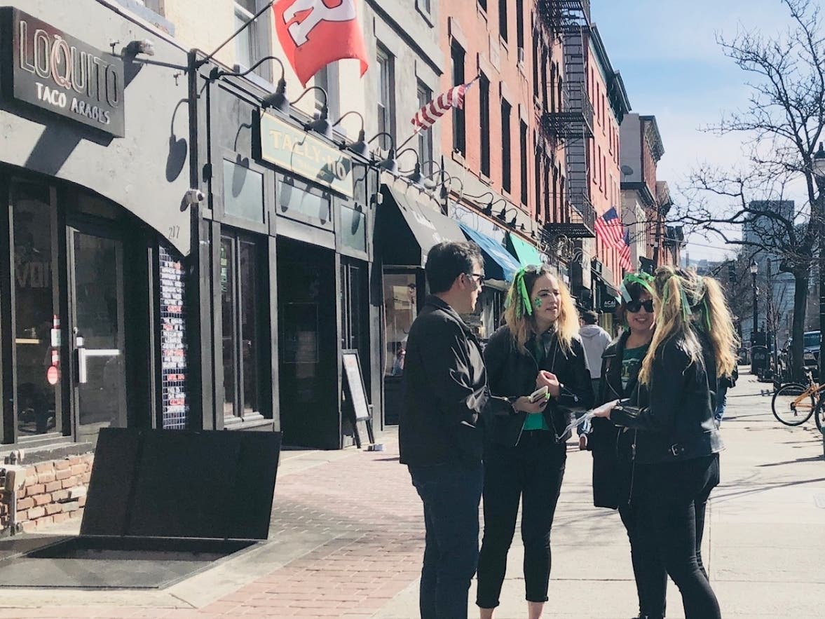 People congregated and celebrated St. Patrick's Day on Washington Street in Hoboken on Saturday.