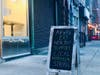 "'Hoboken Strong": A sign at Alfalfa's, a salad and dessert shop in the space formerly claimed by the historic Schnackenberg's Luncheonette on Washington Street in Hoboken.