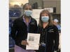 Members of the Overlook Radiology Department enjoy a donation of food and a note of thanks from the Roosevelt Intermediate School Student Government.