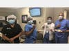 Members of the Overlook Radiology Department enjoy a donation of food and a note of thanks from the Roosevelt Intermediate School Student Government.