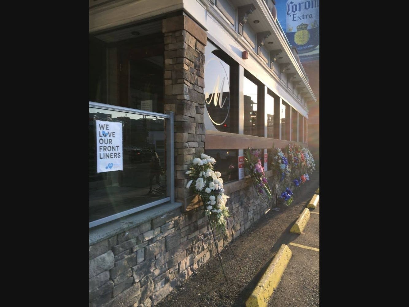 Flowers line the outside of the popular Malibu Diner, near Hoboken's north entrance, because the owner has passed away.
