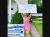 Westfield High School senior Marcelina Krowinska thanks her teachers for their surprise visit to drop off a lawn sign.