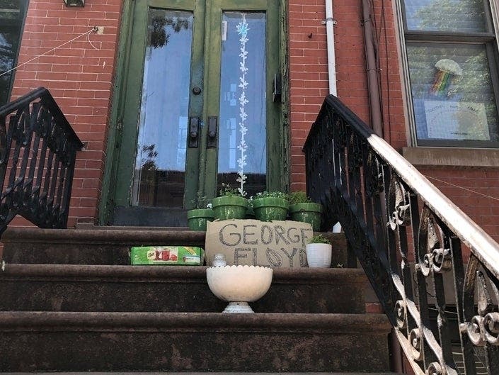 A sign on a house in North Jersey honoring George Floyd.