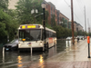 See video at end of story: A NJ Transit bus pulls around a stuck car on Madison Street in Hoboken, a frequent site of flooding, on Friday evening during Tropical Storm Fay.