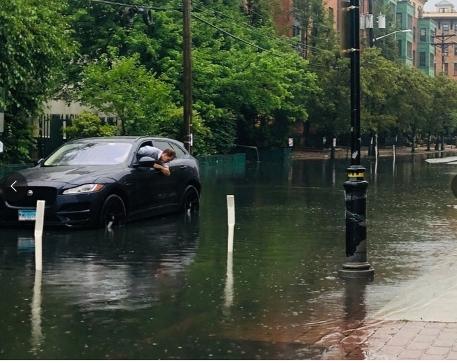 Flash flooding can trap cars. Madison Street, next to ShopRite in Hoboken, this summer.