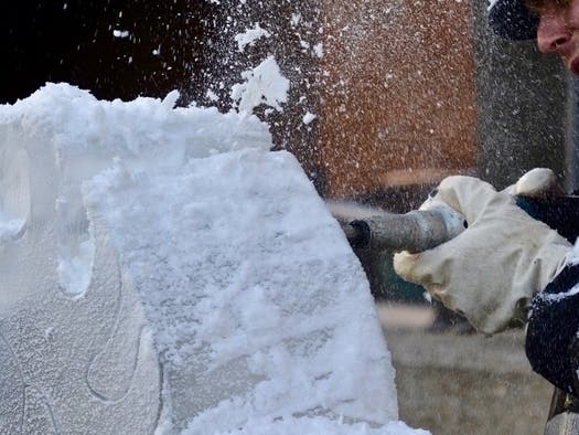 A man works on an ice sculpture (file photo).
