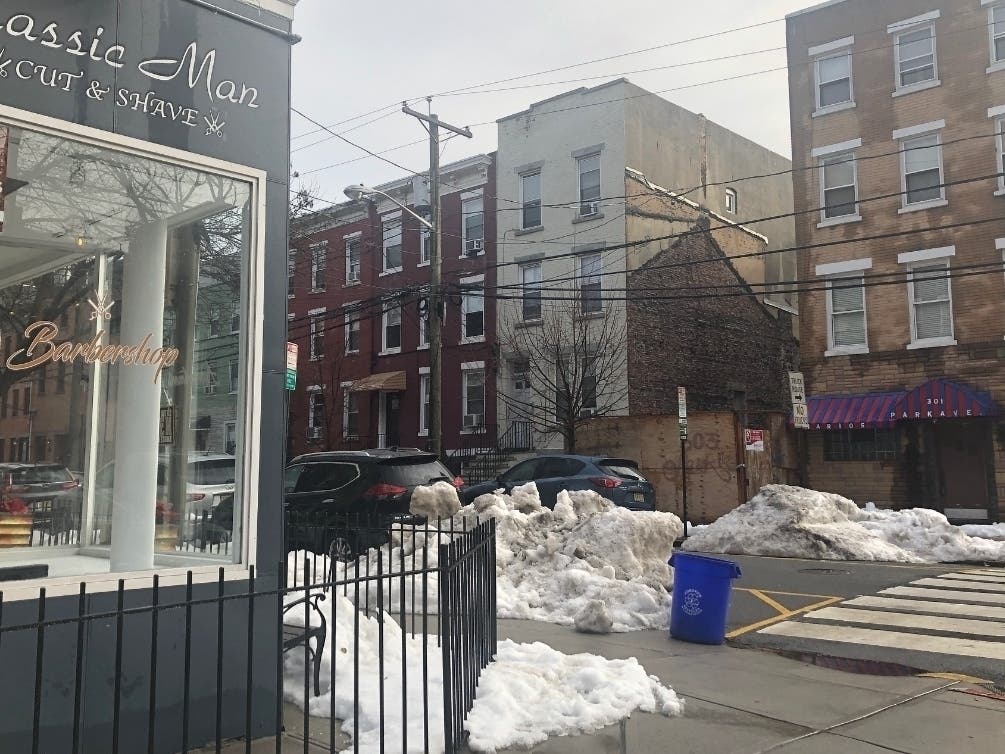 Snow remained on the ground in Hoboken Tuesday from the last two storms, and more is expected Thursday. Pictured: Park Avenue and Third Street.