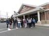 Representatives from Overlook Medical Center celebrated the 25,000th shot at the Summit Community Center recently, including Lauren Yedvab, chief operating officer at Overlook, Clelia Biamonti, executive director of the Overlook Foundation.