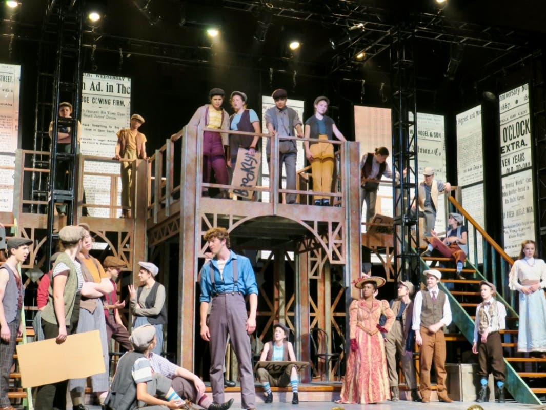Check out those costumes and sets! You can watch Summit High School's spring musical, "Newsies," three ways this week. Get ticket information below.
