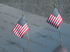 Two American flags are placed at the 9/11 Memorial in New York City in memory of the nearly 3,000 Americans, including at least 750 from New Jersey, who died in the attacks. 