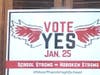 HOW WILL YOU VOTE? Signs encouraging Hoboken residents to vote "Yes" or "No" on Tuesday's school referendum have appeared in windows. Some are encouraging more discussion before and after the vote.