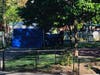 Investigators finished setting up a forensic tent on Monday morning in Church Square Park.