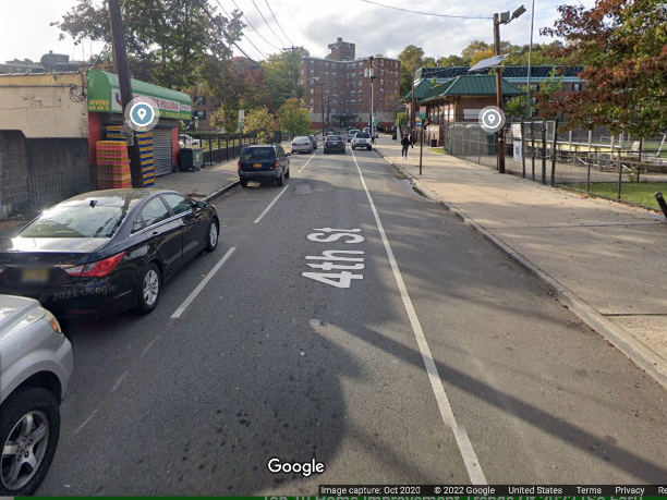 Fourth Street in Hoboken, between Jackson and Harrison streets, where Monday night's shooting took place. A youth flag football game was taking place at the field on the right.