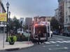 An ambulance waited at Fifth and Washington streets as police investigated a possible "male with a weapon" Monday morning, Aug. 29.