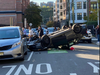 A witness said a car flipped over not far from Wallace Elementary School in Hoboken late Thursday afternoon.
