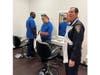 Police helped kids and adults with disabilities enjoy the holidays by serving as storekeepers in a 53,000-square-foot "town."