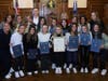 The girls' hockey team, with Head Coach Jill Cosse, Assistant Coach Gianna D’Urso, Essex County Commissioner At-Large Patricia Sebold, and District 4 Commissioner Leonard Luciano.