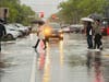 If your umbrella survived April showers, it's time to bring it out again. Pictured: A downpour in Hoboken.