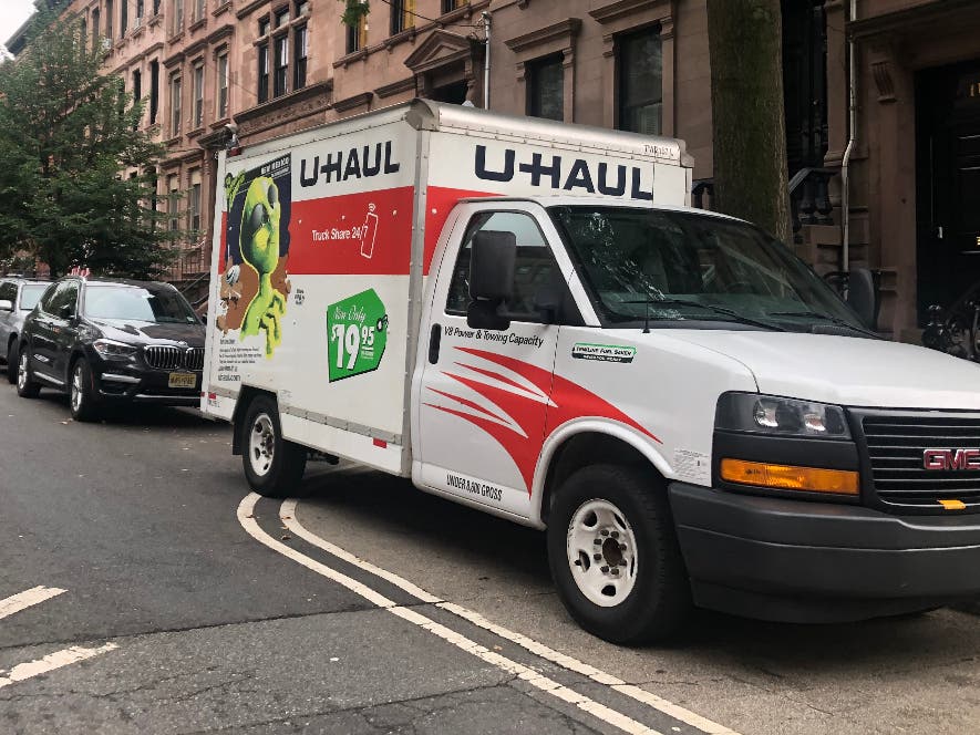 Two people were charged in connection with a stolen U-Haul. 