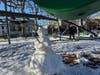 Freezing weather is keeping this Church Square Park snowman intact.