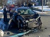 One summons was issued after a school bus and car crashed in a Ridgewood neighborhood on Friday.