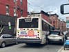 A bus collided with a car on a side street in Hoboken on Friday morning.