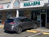 A car crashed into a nail salon in Ridgewood on Monday.