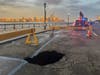 A sinkhole opened on Sinatra Drive in Hoboken, along the Hudson River.