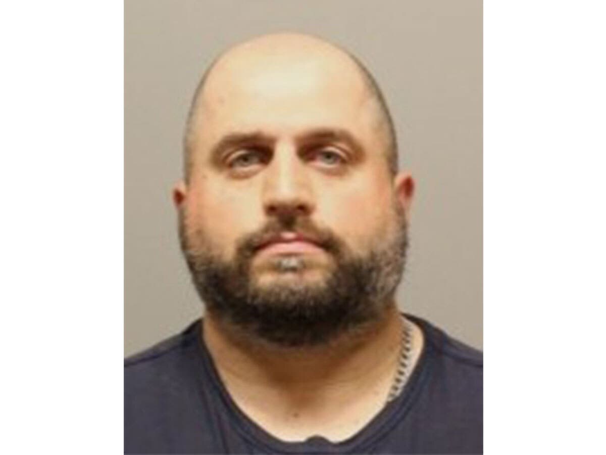 Attilio Dente, 43, who works for the Saddle Brook Police Department, has been charged with aggravated assault and tampering with public records, authorities said.
