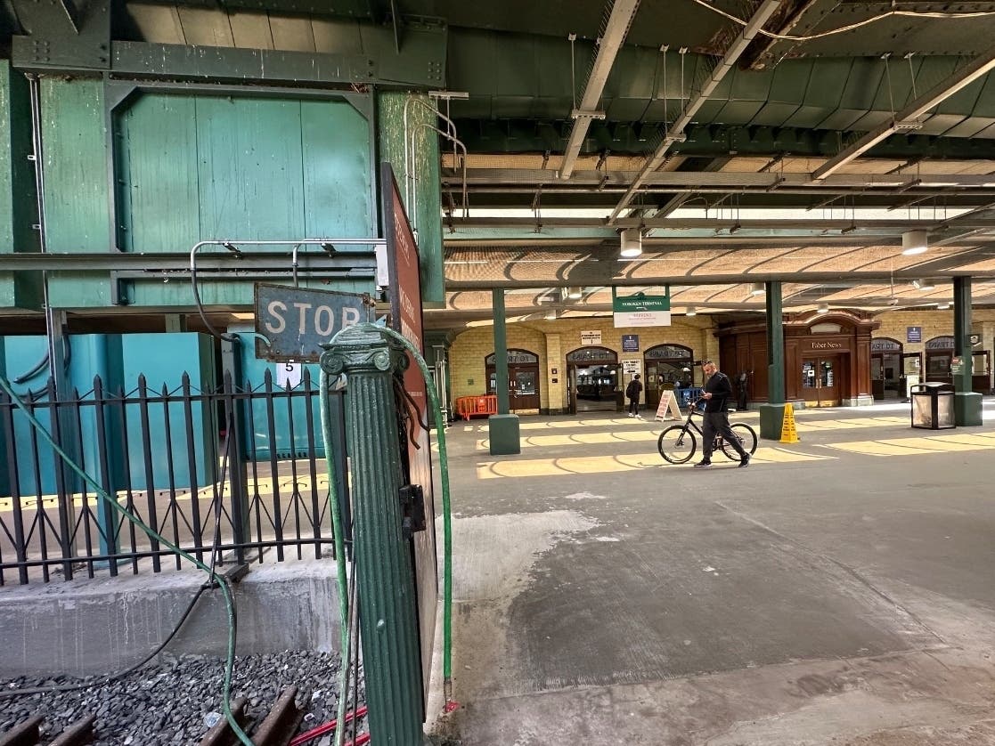 The train crashed on Track 5, near the waiting room.