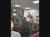 Howard Kopel speaking to the crowd at Chabad of Hewlett