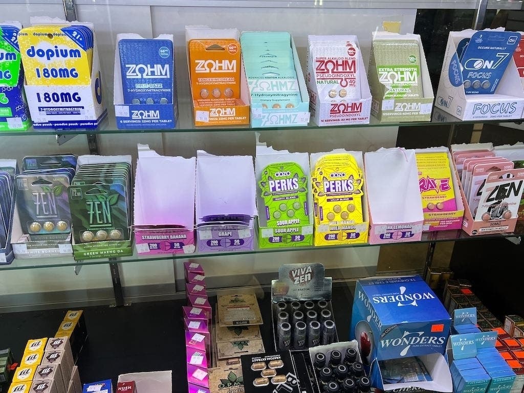 A variety of kratom and 7-OH products — including capsules, cartridges and wellness shots — are on display at a smoke shop in Buffalo, N.Y. States have led the way in regulating kratom, and last year, federal officials moved to ban 7-OH.