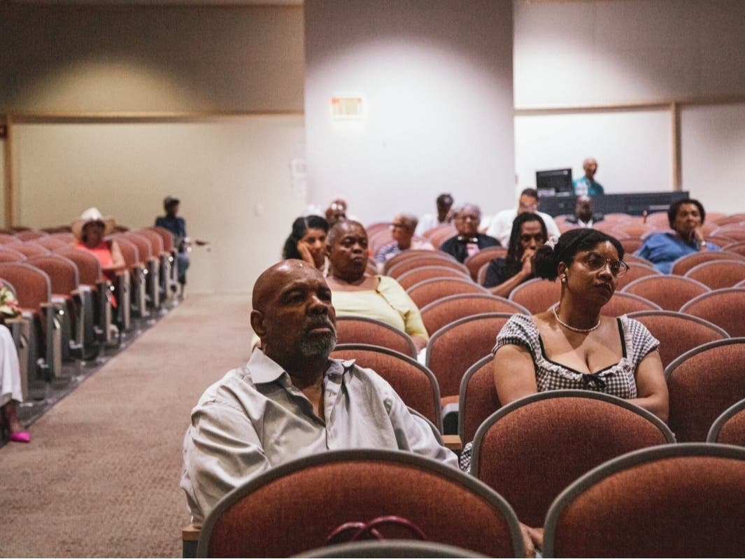 Attendees listen during the commission’s June public listening session.