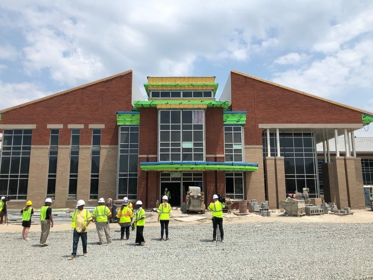 A 2021 tour of the construction of the new Highland Springs High School in Henrico. This fall, voters in several localities will decide whether to impose a 1% sales tax to fund school construction and modernization costs.