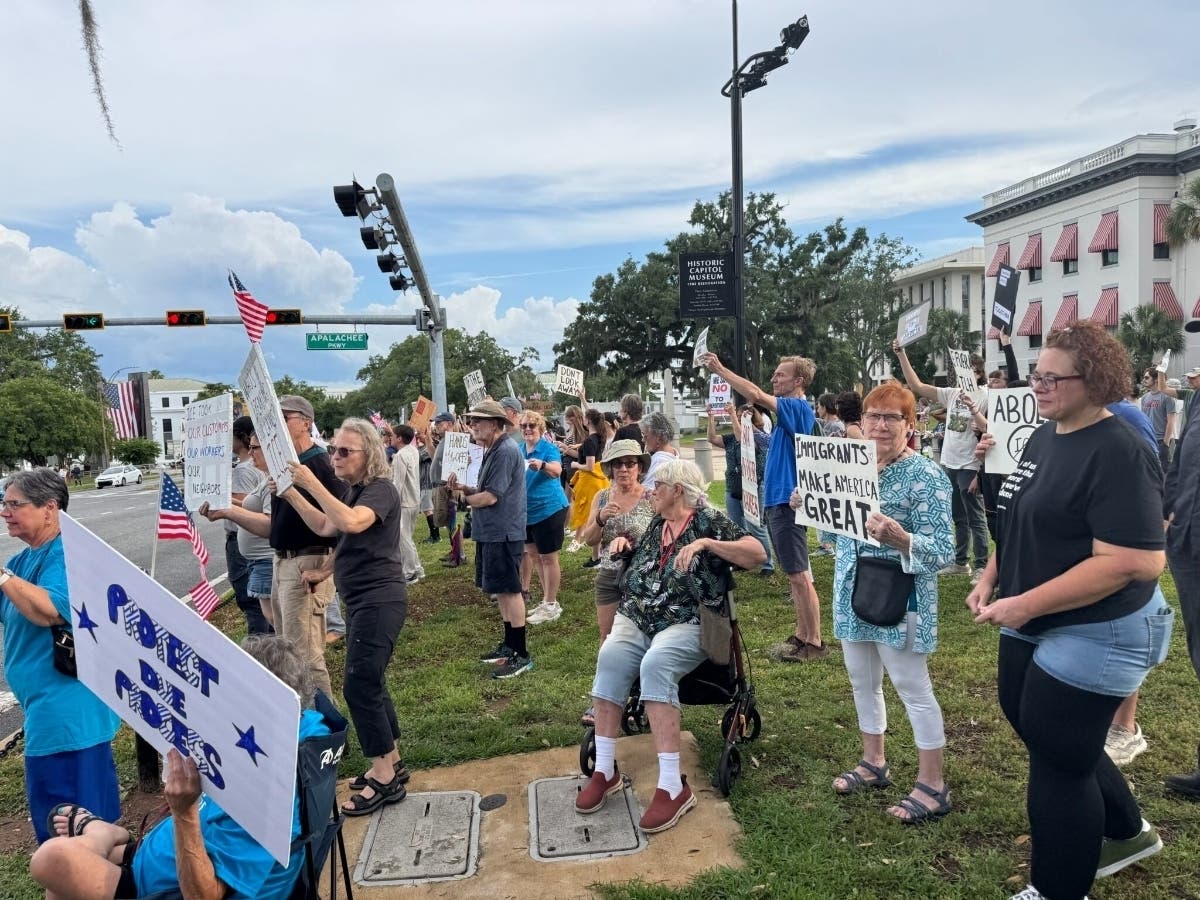 Protesters gathered in front of the Florida Capitol building on May 30, 2025, a day after ICE raided a Tallahassee construction site, detaining more than 100 workers.