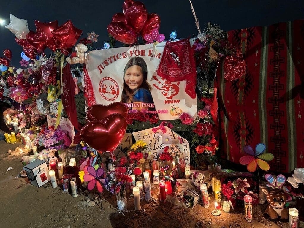 A memorial honoring San Carlos Apache teen Emily Pike can be seen at the intersection of Mesa Drive and McKellips Road in Mesa, Ariz., the location where she was last seen in January. Arizona and several other states have enacted child protection measures