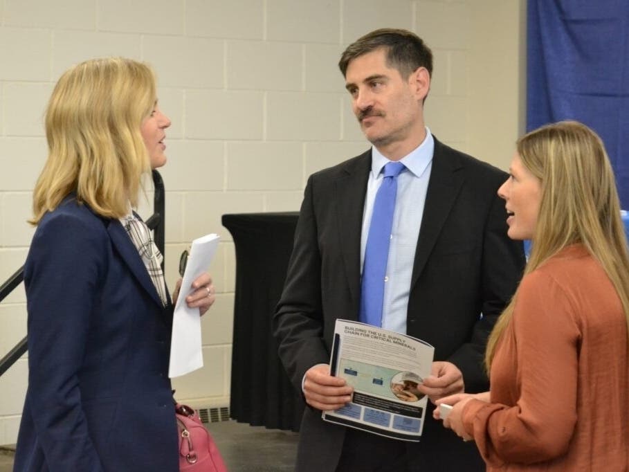 U.S. Rep. Julie Fedorchak, left, speaks with Talon Metals president Mike Kicis, center, and Jessica Johnson, Talon’s vice president for external affairs, on May 28, 2025.