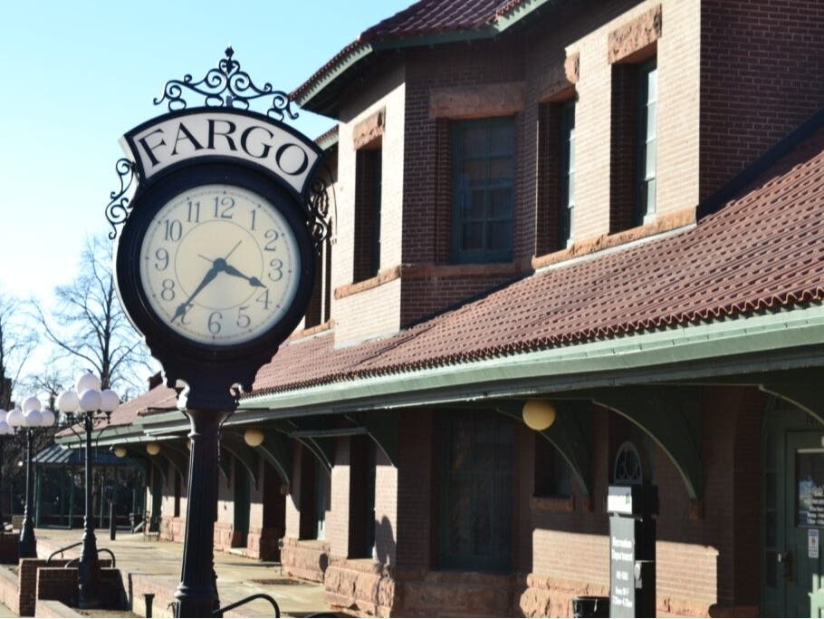 A clock stands in front of the former train depot in downtown Fargo, North Dakota, on March 6, 2025. 