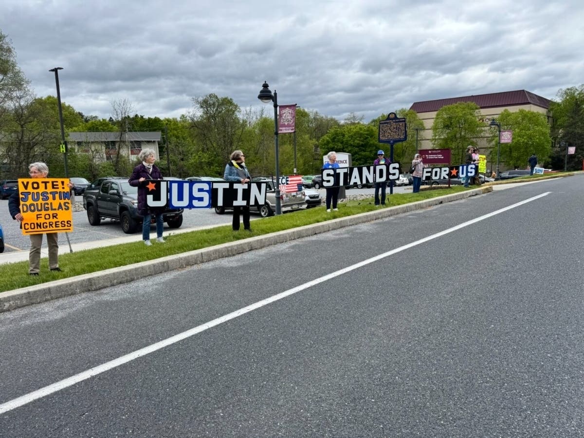  Supporters of Democratic candidate Justin Douglas for Congress lined the street before the candidate's forum at Central Penn College on April 26, 2026.