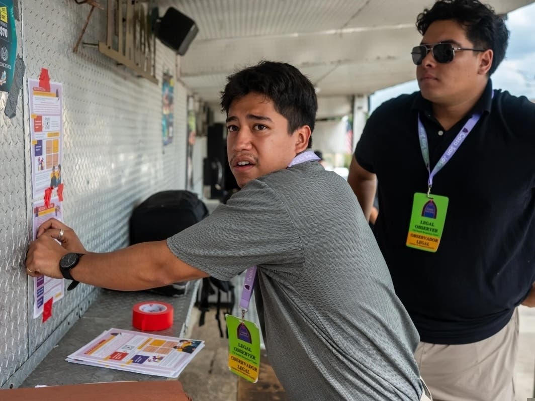 Staff members from Casa San José put up “know your rights” flyers and information on Pittsburgh’s Latino support network outside of Las Palmas grocery store and taqueria, Wednesday, Sept. 9, 2026, in Beechview.