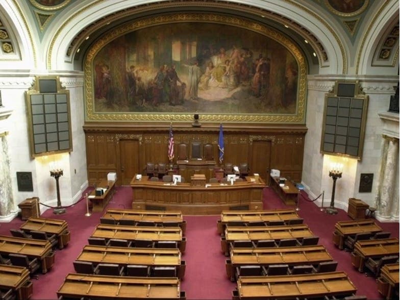 The Wisconsin Assembly chamber. Elections in August and November will determine who fills these seats and those in the state Senate.