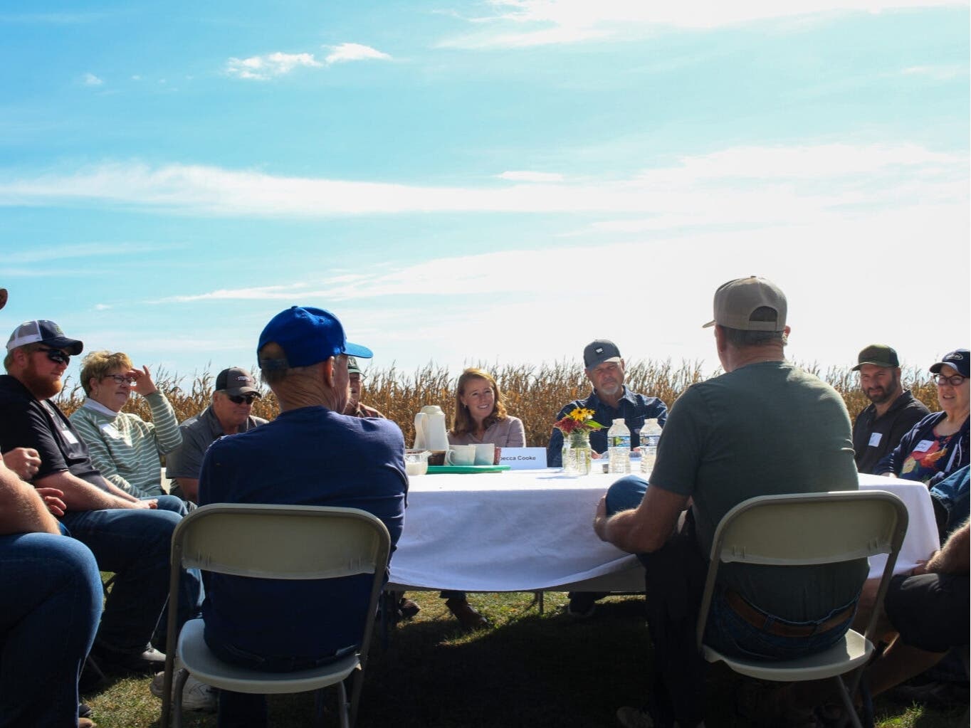Democratic congressional candidate Rebecca Cooke and former U.S. Sen. Jon Tester (D-Montana) appear at an agricultural policy roundtable event at the Eau Claire-area farm Cooke grew up on.